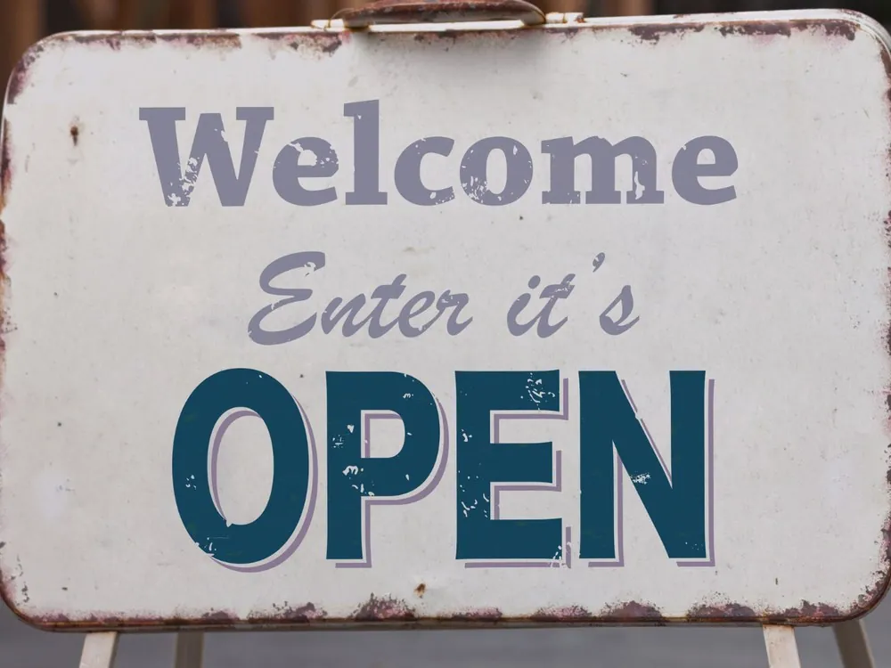 Small business owner reviewing financial records